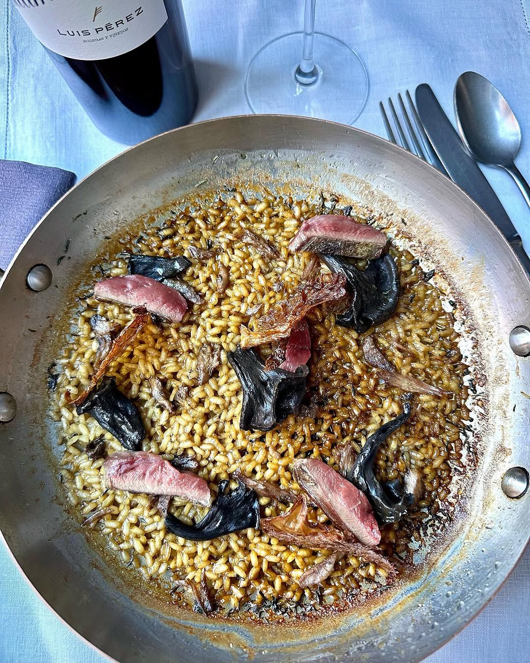 Arroz de paloma torcaz y setas en 