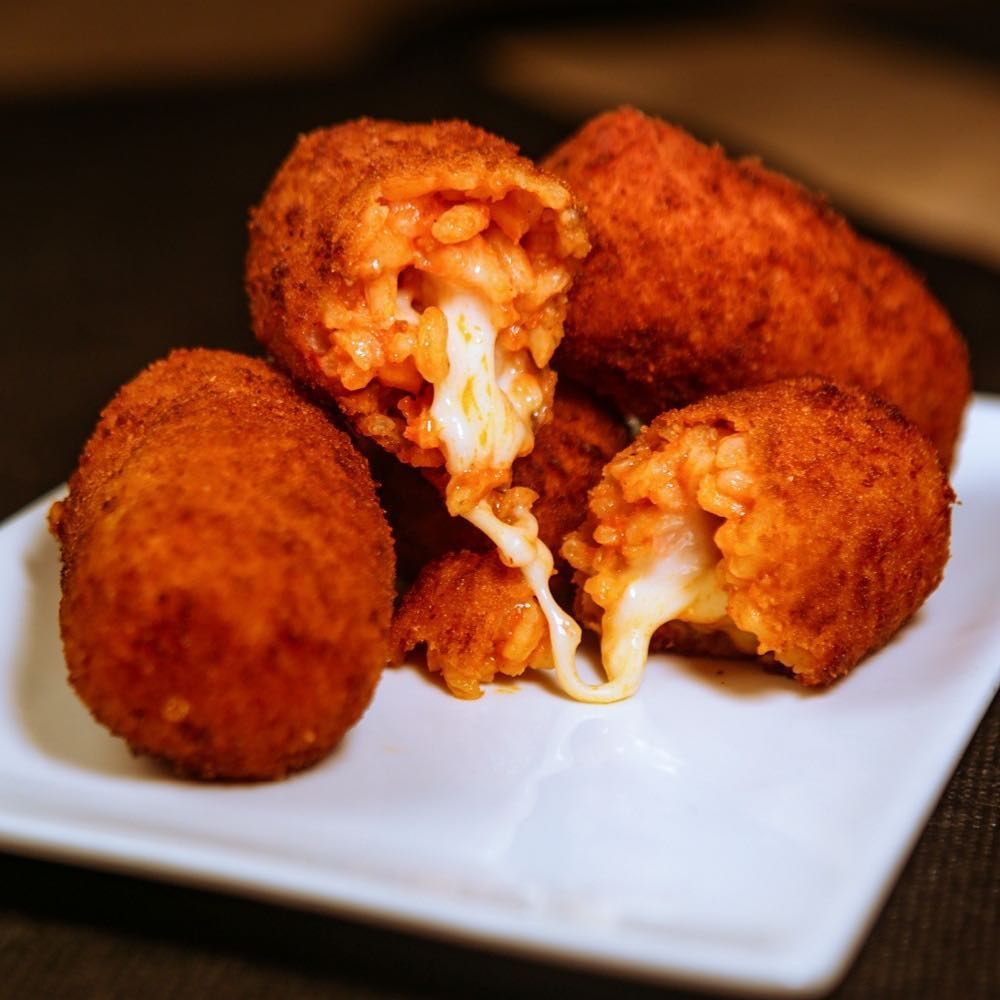 supplì con ragù de carne en 