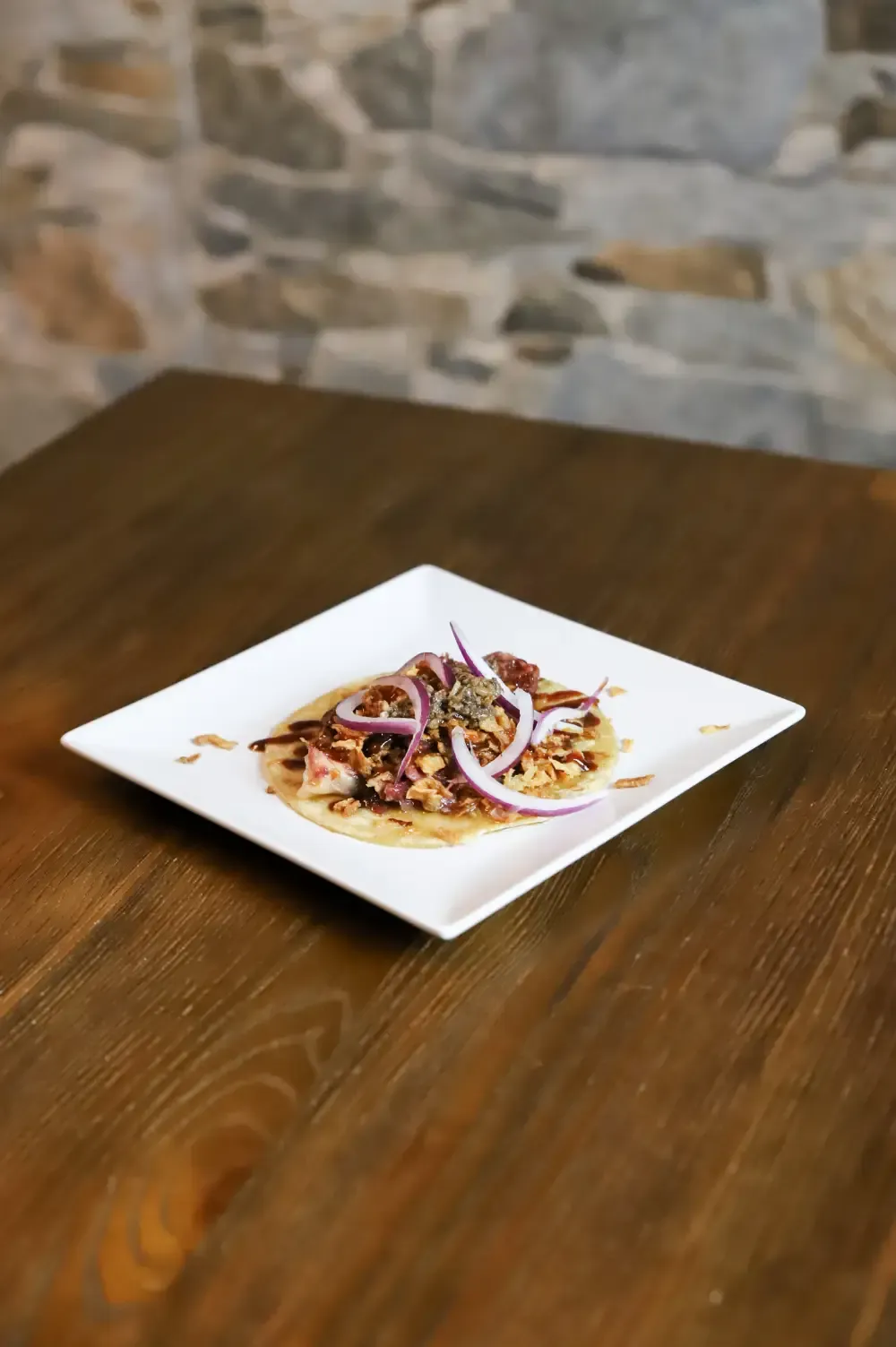 taco with duck confit en 